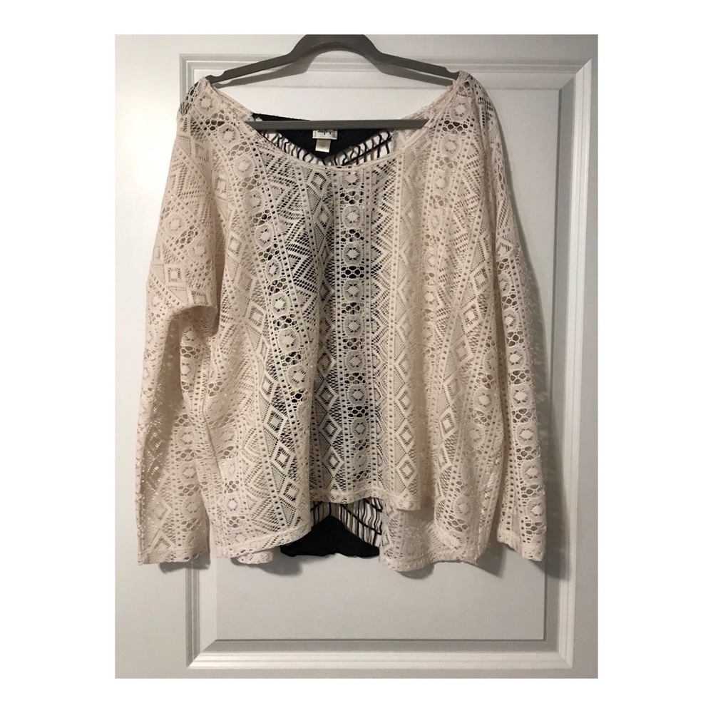 Cutout cream blouse with design on back